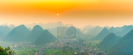 Landscape in Bac Son valley around with mountains panorama view and sunset sky in Lang Son, Vietnam