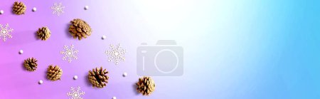 Photo for Christmas pine cones with snow flakes - flat lay - Royalty Free Image