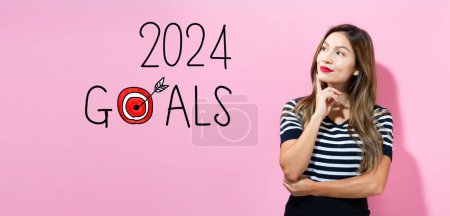 Téléchargez les photos : 2024 Buts avec jeune femme dans une pose réfléchie - en image libre de droit