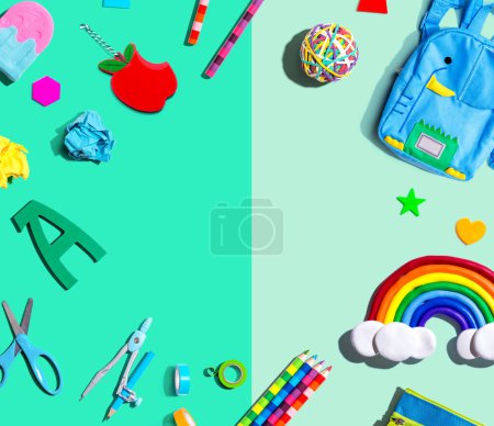 Téléchargez les photos : School supplies with a rainbow - overhead view - flat lay - en image libre de droit