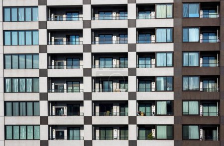 Téléchargez les photos : Gros plan de façade gratte-ciel abstrait motif de fond urbain - en image libre de droit