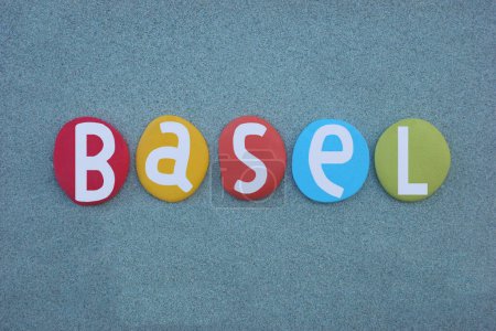 Basel, also known as Basl, city in northwestern Switzerland on the river Rhine and third-most-populous cityof the central Europe country, souvenir composed with hand painted multi colored stone letters over green sand