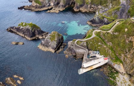 Photo for Drone aerial view of Dunquin pier at slea head drive dingle peninsula in the Atlantic way. Ireland Europe. - Royalty Free Image