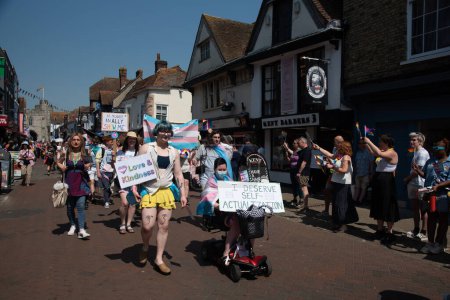 Photo for Canterbury, Kent, United Kingdom, June 10 2013: Happy pride people and supporters parading at the pride parade at Canterbury city in Kent UK - Royalty Free Image