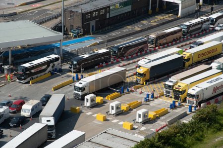 Photo for Dover, United Kingdom, June 09 2023 : Trucks on port of Dover docks station. Dover harbour connects Europe with United Kingdom and handles passengers, vehicles and cargo. - Royalty Free Image