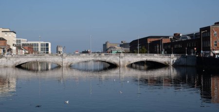 Photo for Urban cityscape of cork city river lee and Saint particks bridge. Ireland europe. - Royalty Free Image