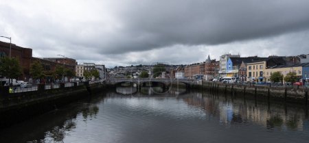 Photo for Cork, Ireland, September 9 2021:Urban cityscape of cork city river lee and Saint particks bridge. Ireland europe. - Royalty Free Image