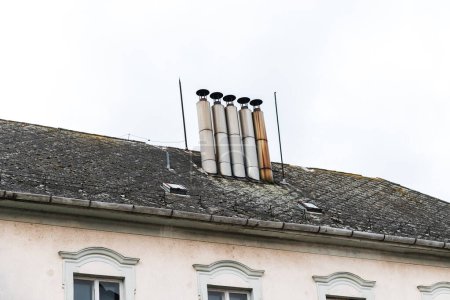 Photo for Close-up view of chimneys on the rooftops - Royalty Free Image