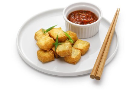 crispy cubed tofu puffs with chili sauce
