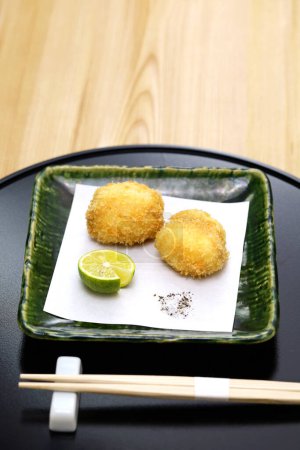 Photo for Fried puffer fish milt, traditional Japanese cuisine - Royalty Free Image