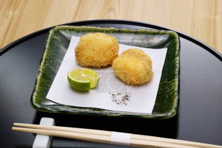 Photo for Fried puffer fish milt, traditional Japanese cuisine - Royalty Free Image