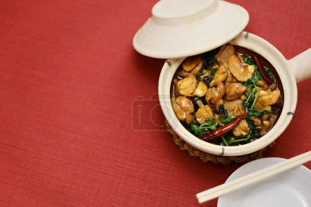 Photo for Three-cup chicken ( San Bei Ji ) in a clay pot, Taiwanese traditional food - Royalty Free Image