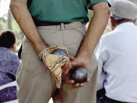 Playing jeu de boules, or also called petanque, in France