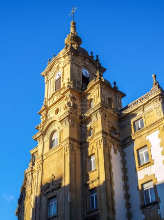 Clock tower of Corazon de Maria Church on a blue sky. San Sebastian, Gipuzkoa, Basque country, Spain.
