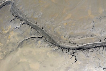 Foto de Aerial view of abstract muddy background. Decanting pond, copper mining residuals - Imagen libre de derechos