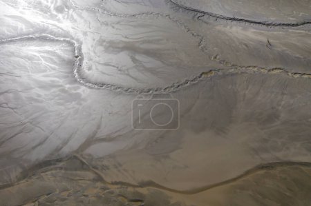 Photo for Aerial view of abstract muddy background. Decanting pond, copper mining residuals - Royalty Free Image