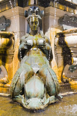 Lactating Nereid at Neptune Fountain in Bologna, Italy.