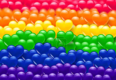 Background with heart. Multi-colored volumetric hearts in the colors of the LGBT pride rainbow. Texture for banner and postcard. Vector illustration