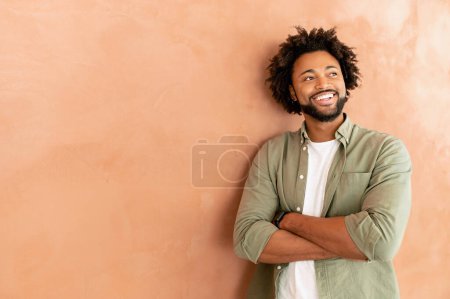 Photo for Successful cheerful confident young bearded african-american adult male entrepreneur businessman professional in casual wear standing with arms crossed and looking aside, curly guy isolated - Royalty Free Image