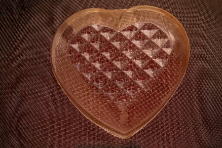 Téléchargez les photos : Fond avec un coeur en plastique - en image libre de droit