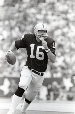 Photo for Oakland Raiders quarterback Jim Plunkett in NFL Action during the 1980s.  This image came from B&W negative - Royalty Free Image