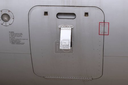 Photo for Close Up Door Control From A Fokker 100 Plane At Schiphol Airport The Netherlands 26-5-2022 - Royalty Free Image