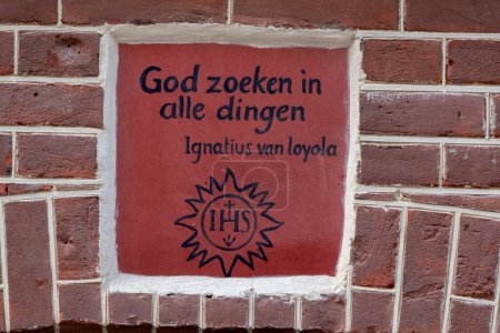 Photo for Slogan On The Ignatiushuis Building At Amsterdam The Netherlands 28-6-2022 - Royalty Free Image