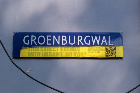 Photo for Street Sign Groenbrugwal With Protest Sticker Against The Ukraine War At Amsterdam The Netherlands 23-6-2022 - Royalty Free Image