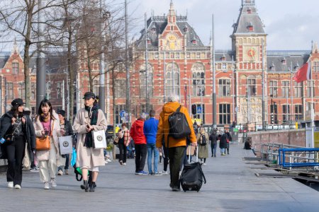 Photo for The Central Train Station In The Background At Amsterdam The Netherlands 14-3-2022 - Royalty Free Image
