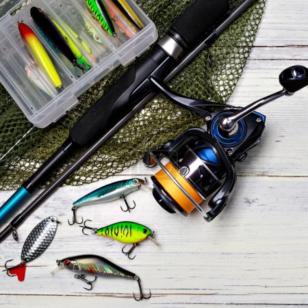 Photo for Fishing tackle on wooden background - Royalty Free Image