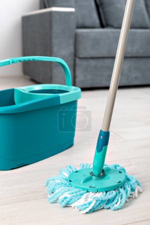 Photo for Floor mop and bucket for washing in room - Royalty Free Image