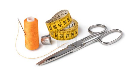 Photo for Thread sewing, needle, centimeter, scissors, on a white background - Royalty Free Image