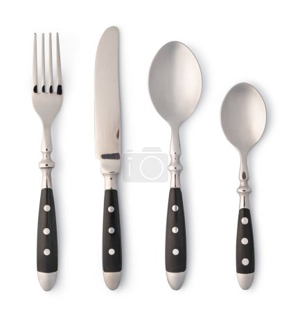 Foto de Juego de cubiertos con tenedor, cuchillo y cuchara aislados sobre fondo blanco - Imagen libre de derechos
