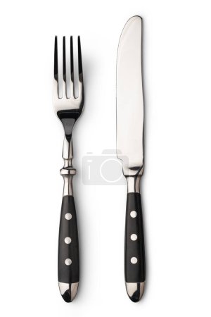 Téléchargez les photos : Fourchette et couteau isolés sur fond blanc - en image libre de droit