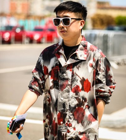 Photo for MILAN, Italy- June 19 2022: Declan Chan on the street in Milan. - Royalty Free Image