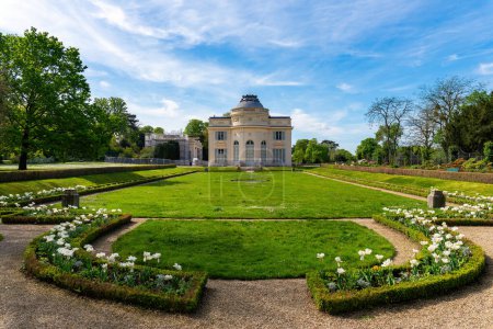 Bagatelle castle in the Bagatelle park at springtime. This small castle was built in 1777 in Neoclassical-style. Located in Boulogne-Billancourt near Paris, France