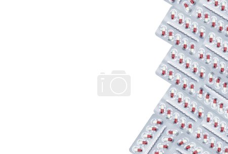 Photo for White-red capsule pill in blister pack isolated on white background. Prescription drug. Pharmaceutical industry. Pregabalin for nerve pain and anticonvulsant. Neuropathic drug. Pharmaceutical drug. - Royalty Free Image