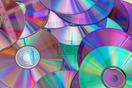 Photo for Pile of shiny compact discs pattern background - Royalty Free Image