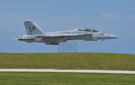 Photo for Cleveland National Airshow. Burke Lakefront Airport. September 3, 2023. US Navy Super Hornet Jet skimming along landing strip before gaining altitude - Royalty Free Image
