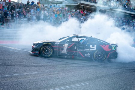 Photo for Ross Chastain celebrates his win for the Echo Park Automotive Grand Prix at Circuit of The Americas in Austin, TX. - Royalty Free Image