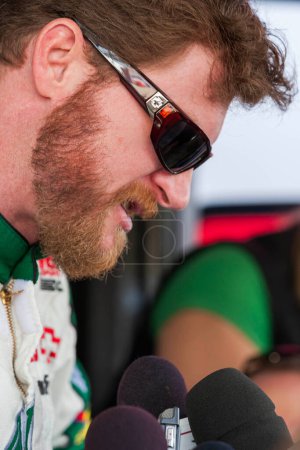 Photo for DARLINGTON, SC - MAY 06, 2011: Dale Earnhardt, Jr. (88) takes questions from the media before a practice session for the Showtime Southern 500 race at the Darlington Raceway in Darlington, SC. - Royalty Free Image