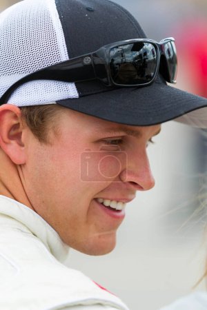 Photo for LEBANON, TN - APR 23, 2011:  Trevor Bayne (16) shares a few laughs before the Nashville 300 race at the Nashville Superspeedway in Lebanon, TN. - Royalty Free Image