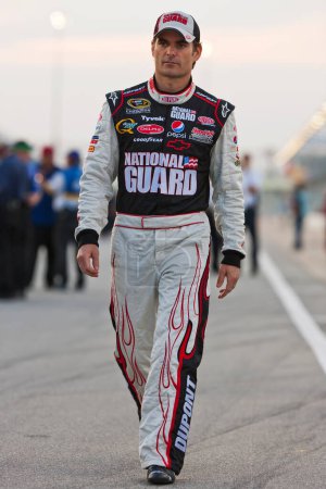 Photo for 09 July, 2009:  DuPont Chevrolet driver, Jeff Gordon, walks to his Chevrolet Impala during qualifying for the LifeLock.com 400 race at the Chicagoland Speedway in Joliet, IL. - Royalty Free Image