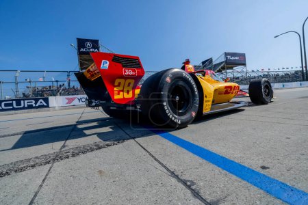 Photo for ROMAIN GROSJEAN (28)  of Geneva, Switzerland comes off pit road during a practice for the Acura Grand Prix of Long Beach on The Streets of Long Beach in Long Beach CA. - Royalty Free Image