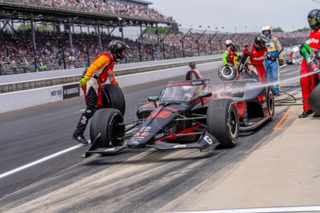 Photo for INDYCAR driver, CHRISTIAN LUNGAARD (45) of Hedensted, Denmark, brings his Rahal Letterman Lanigan Racing Honda in for service during the Indianapolis 500 at the Indianapolis Motor Speedway in Indianapolis, IN, USA. - Royalty Free Image