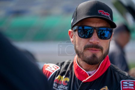 Photo for NASCAR Cup Series driver, JJ Yeley, prepares to race for the ADVENT Health 400 in Kansas City, KC, USA - Royalty Free Image