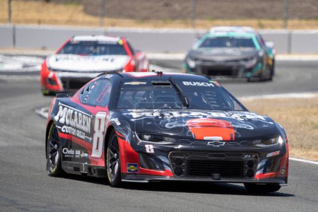 Photo for NASCAR Driver, Kyle Busch, takes to the track for the Toyota SaveMart 350 at the Sonoma Raceway in Sonoma CA. - Royalty Free Image