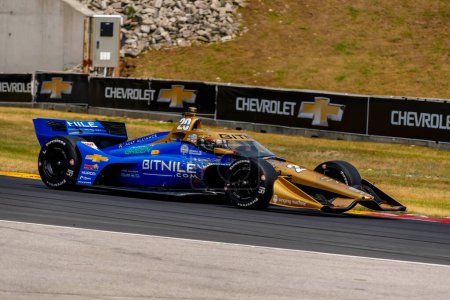 Photo for RYAN HUNTER-REAY (20) of Ft. Lauderdale, Florida travels through the turns during a practice for the Sonsio Grand Prix at Road America in Elkhart Lake WI. - Royalty Free Image
