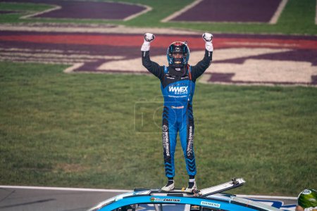 Photo for NASCAR Cup Driver, Ross Chastain celebrates his win for the Ally 400 at the Nashville Superspeedway in Lebanon TN. - Royalty Free Image