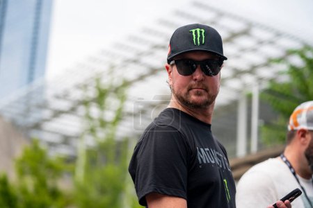 Photo for NASCAR Cup Driver, Kurt Busch, watches his teammates take to the track for the Inaugural Grant Park 220 on the Chicago Street Course in Chicago IL. - Royalty Free Image